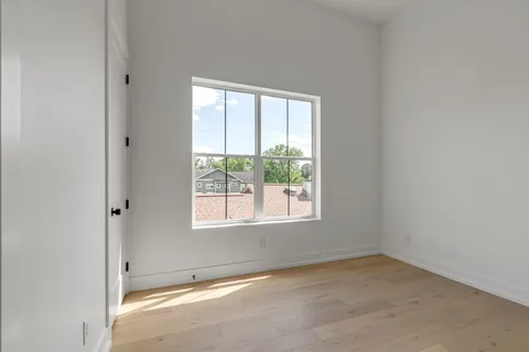 a bathroom with a toilet a sink and shower