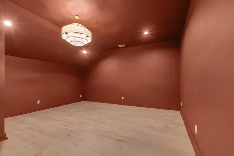 a view of a house with a porch and furniture