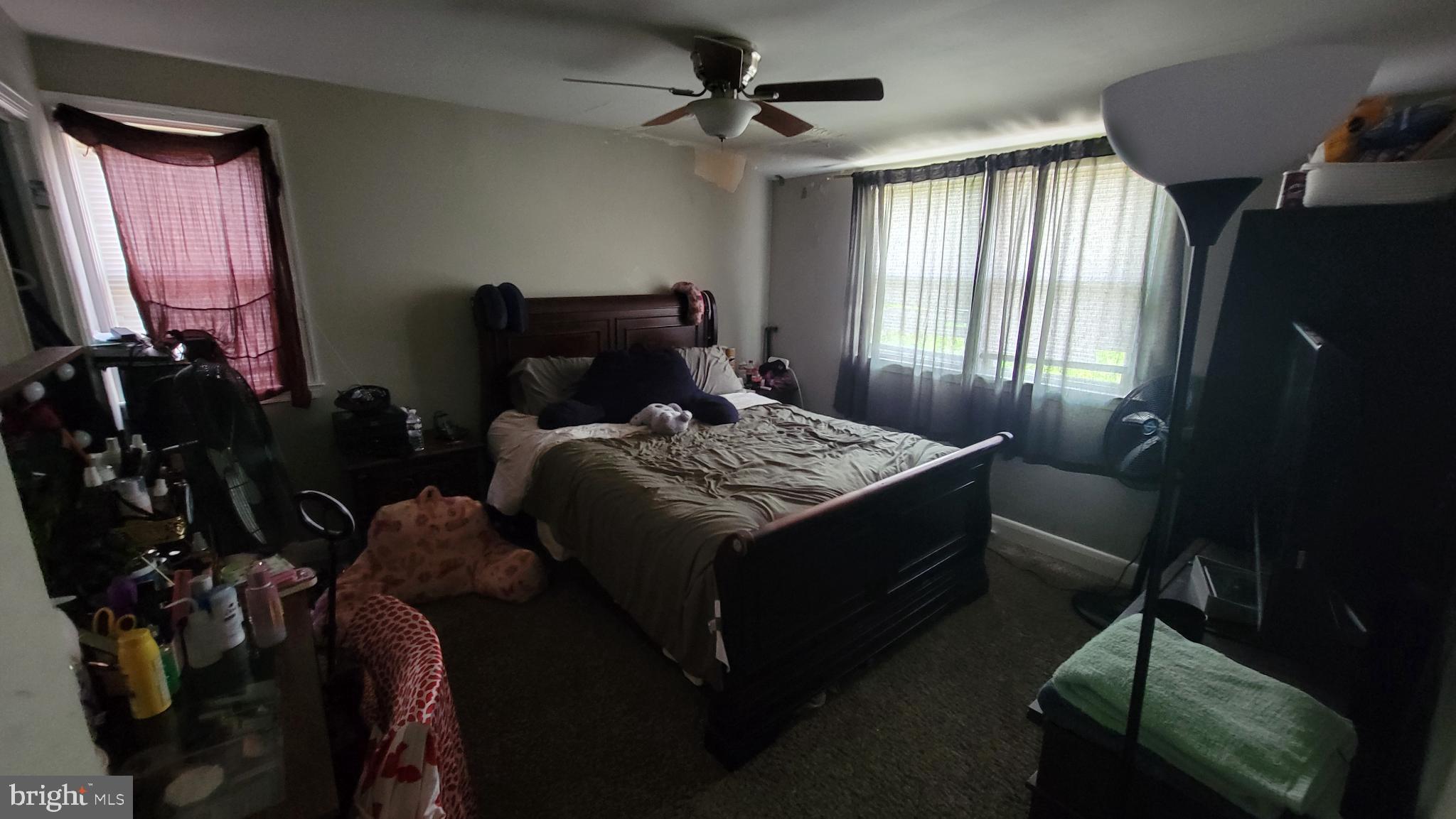 5105 Plymouth Road Baltimore, MD 21214 - Photo 13 of 29 Cozy bedroom with natural light and charm.