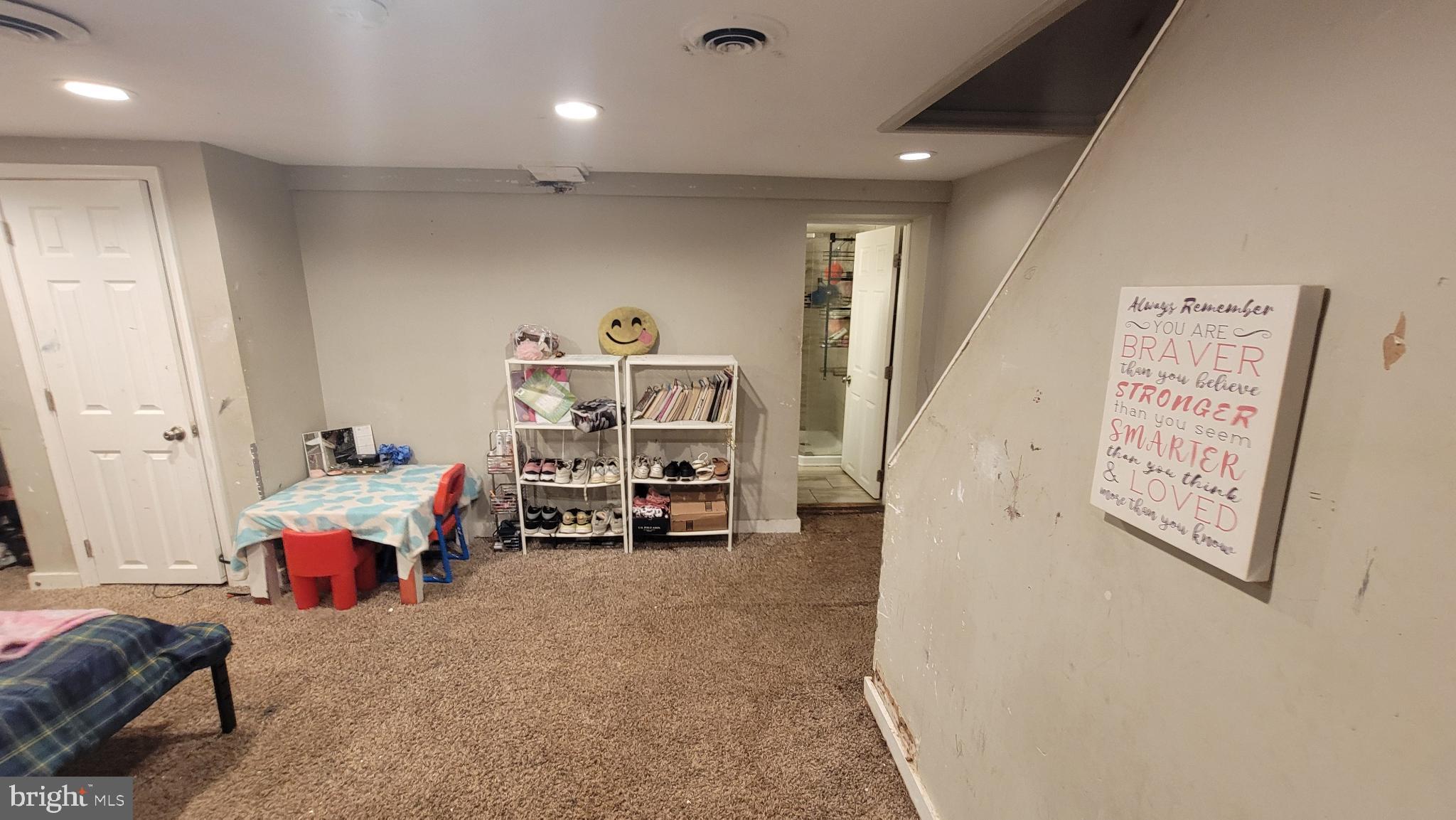 5105 Plymouth Road Baltimore, MD 21214 - Photo 17 of 29 Cozy basement retreat with playful decor.