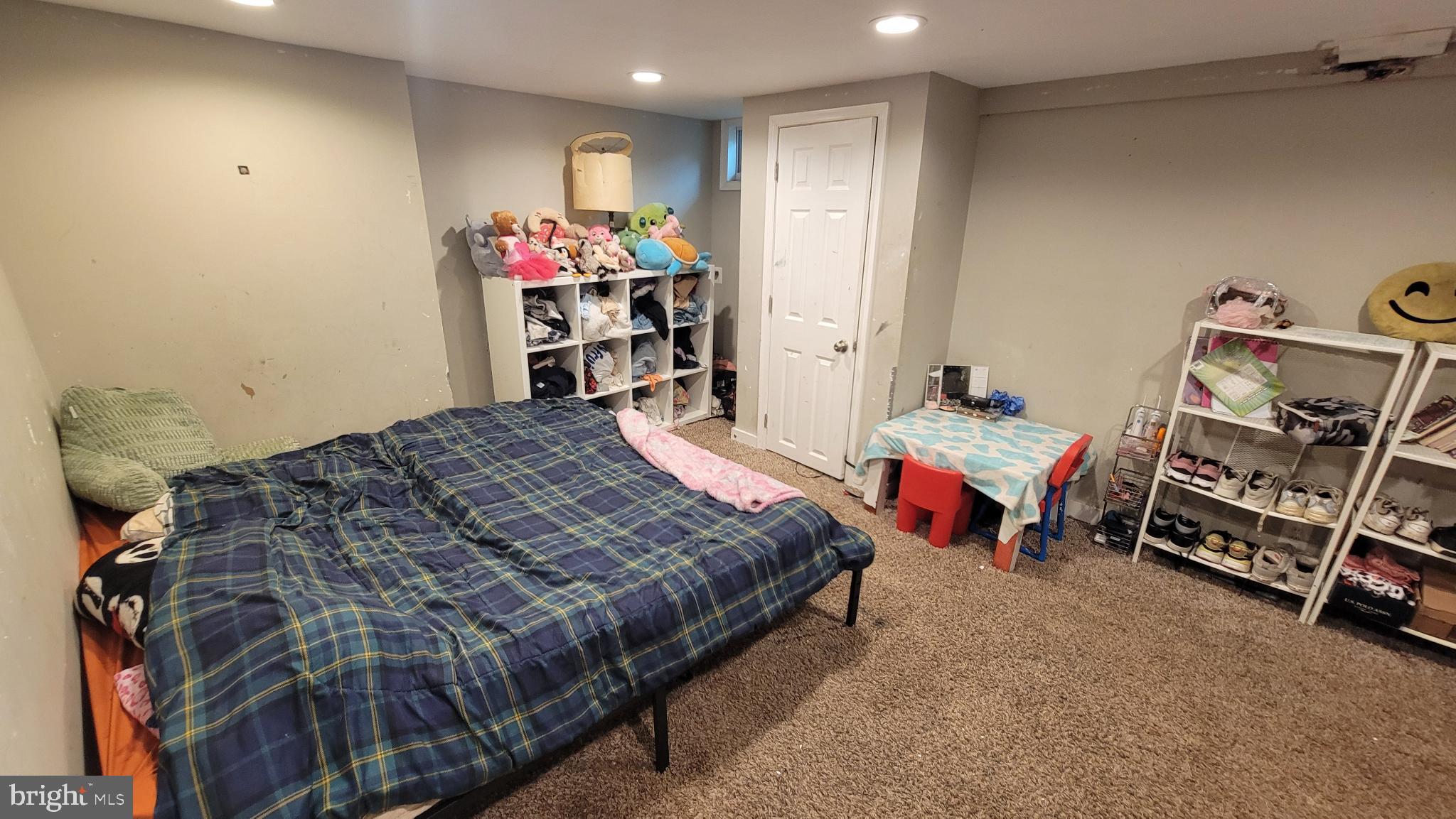 5105 Plymouth Road Baltimore, MD 21214 - Photo 18 of 29 Cozy basement retreat with playful decor.