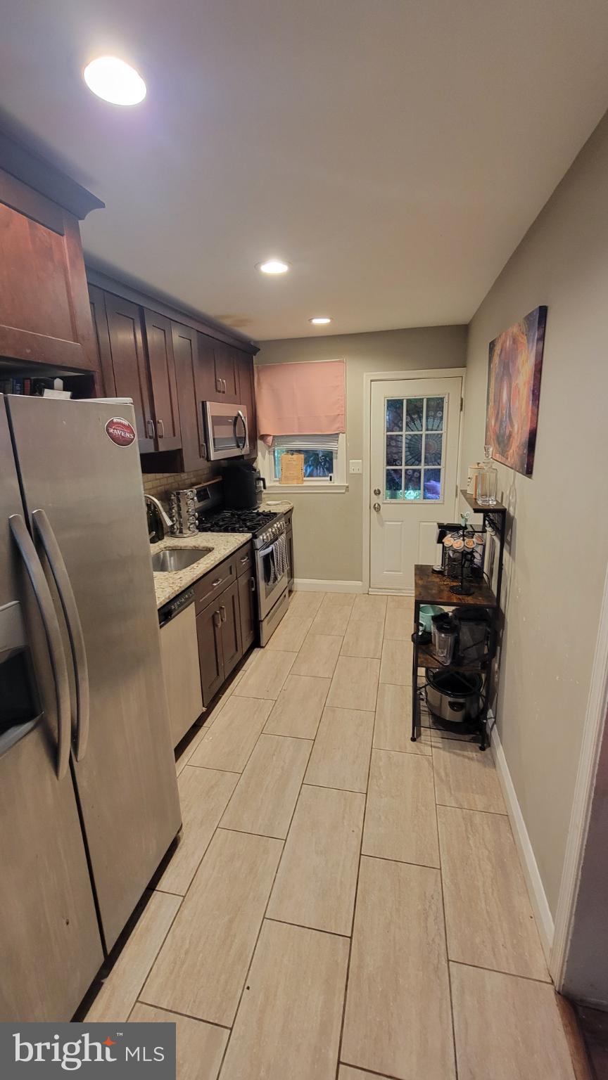 5105 Plymouth Road Baltimore, MD 21214 - Photo 24 of 29 Charming kitchen with modern finishes.