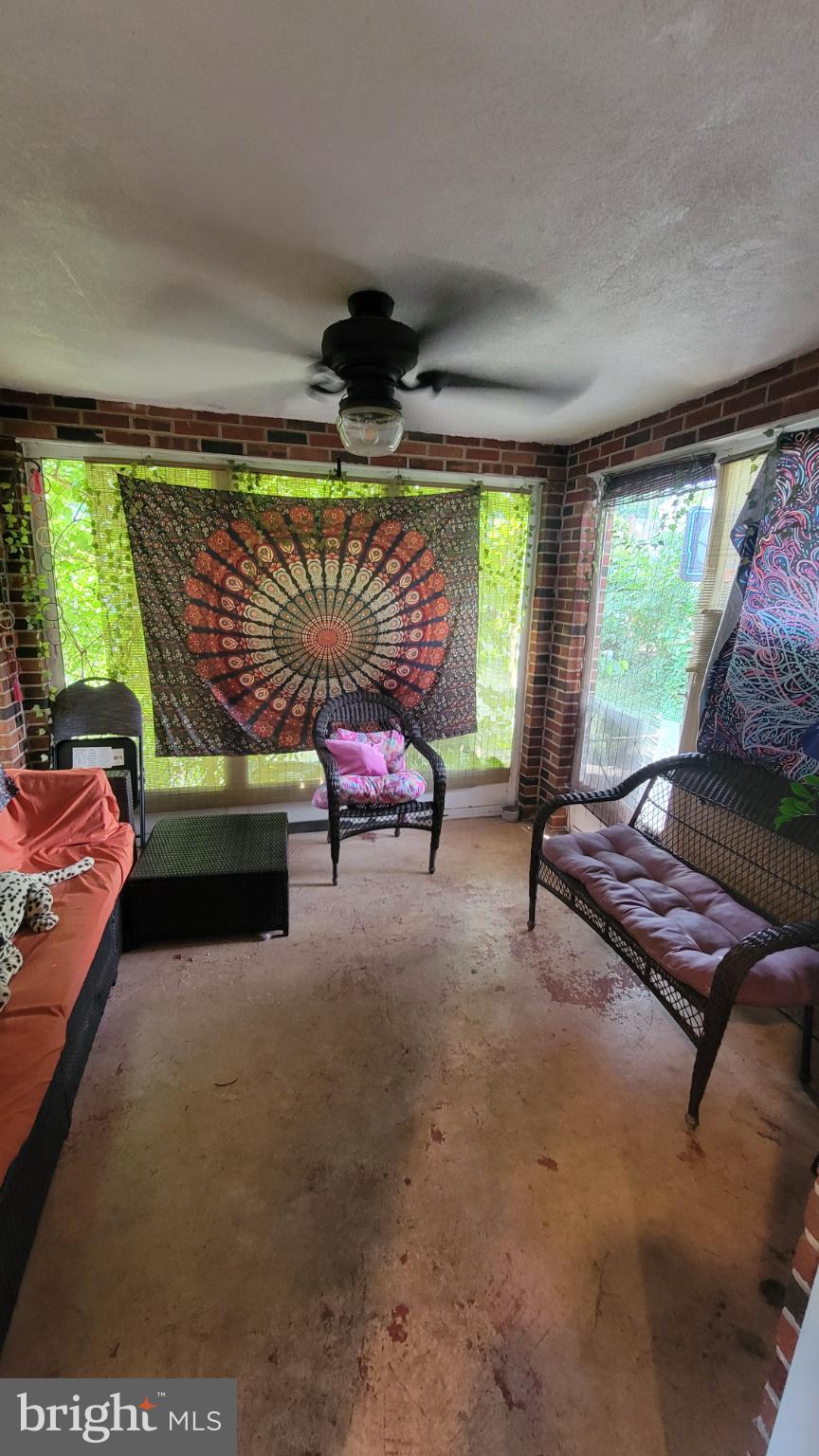 5105 Plymouth Road Baltimore, MD 21214 - Photo 25 of 29 Charming sunlit space with vibrant decor.