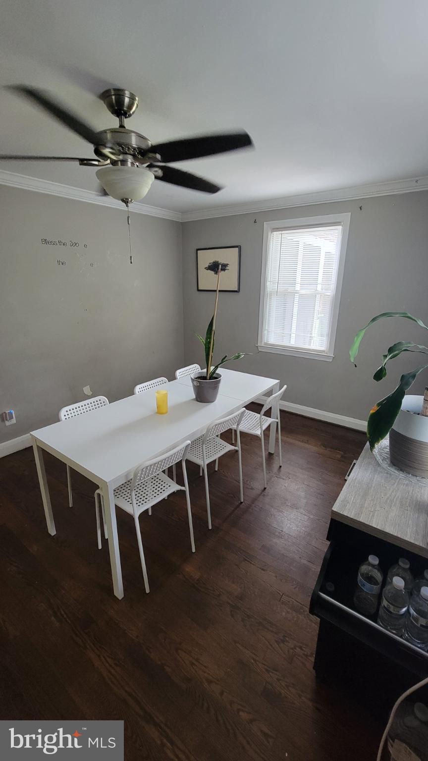 5105 Plymouth Road Baltimore, MD 21214 - Photo 26 of 29 Bright and airy dining space with modern flair.