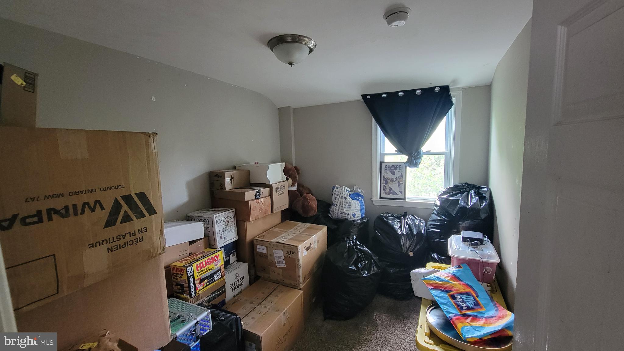 5105 Plymouth Road Baltimore, MD 21214 - Photo 8 of 29 Cluttered space brimming with potential.