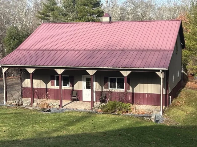 a front view of house with yard