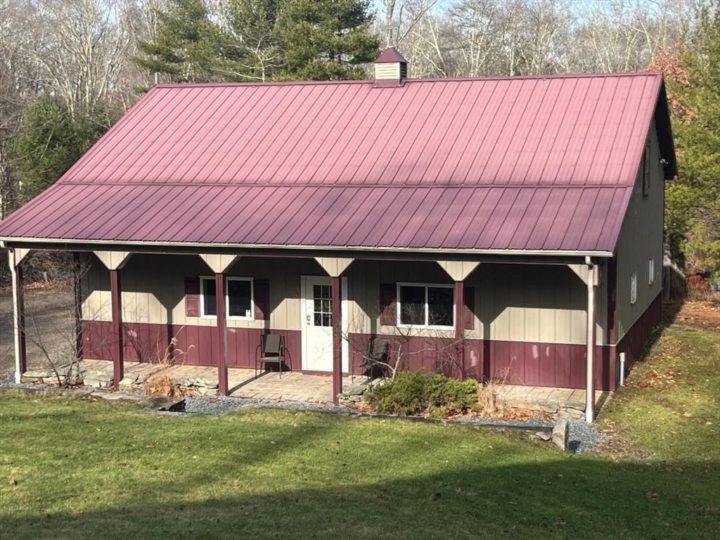 985 Glebe Street Taunton, MA 02780 - Photo 14 of 23 a front view of house with yard