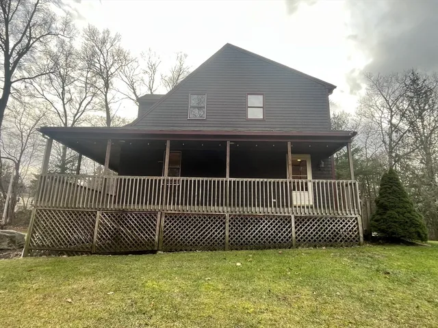 a view of a house with a fence