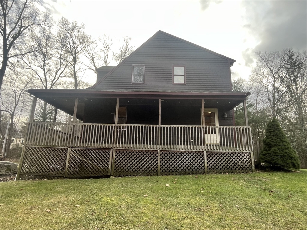 985 Glebe Street Taunton, MA 02780 - Photo 4 of 23 a view of a house with a fence