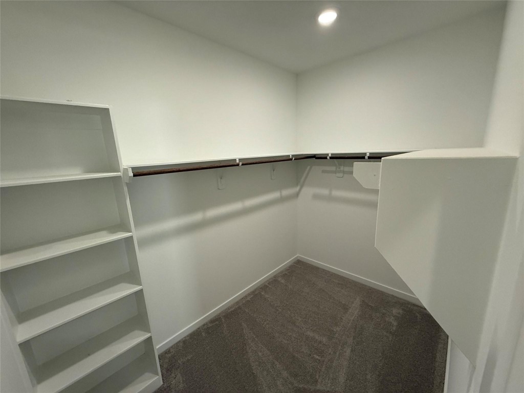 9315 Zander Drive Baytown, TX 77521 - Photo 12 of 21 a view of an empty walk in closet