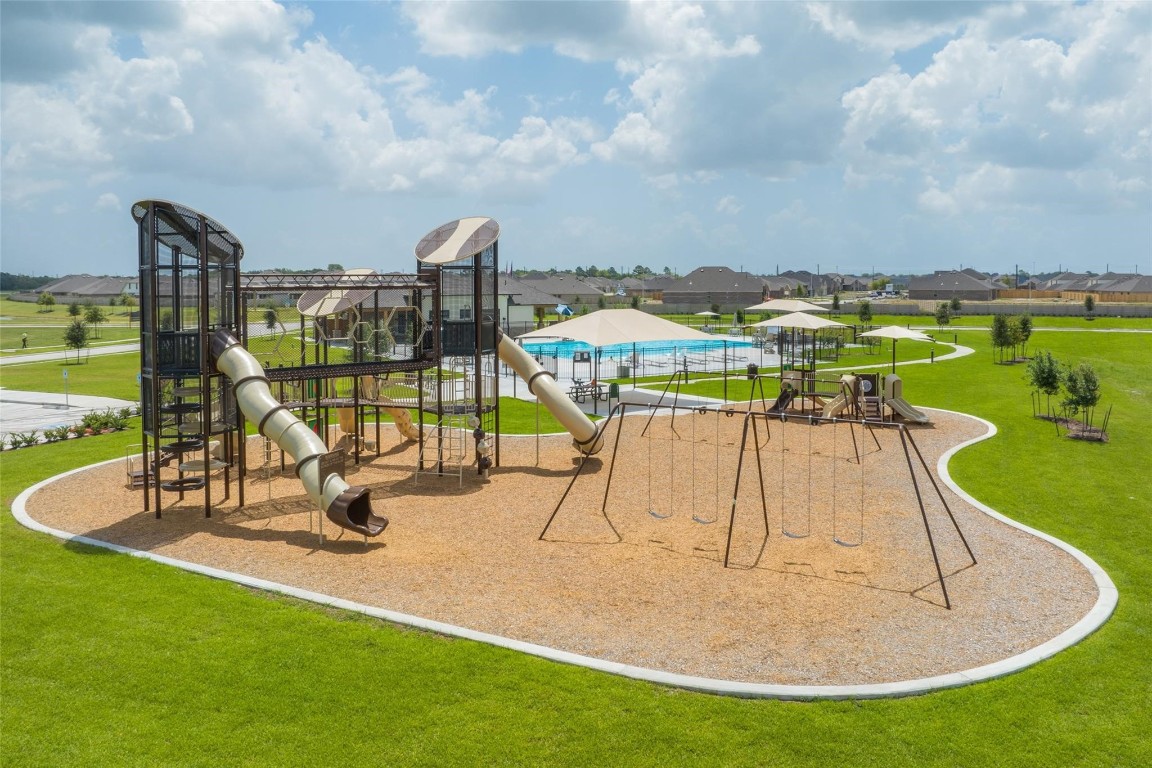 9315 Zander Drive Baytown, TX 77521 - Photo 17 of 21 an ocean view with outdoor seating