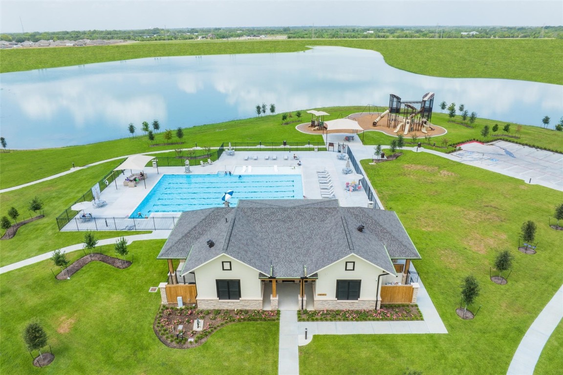 9315 Zander Drive Baytown, TX 77521 - Photo 19 of 21 an aerial view of a house with a garden and swimming pool