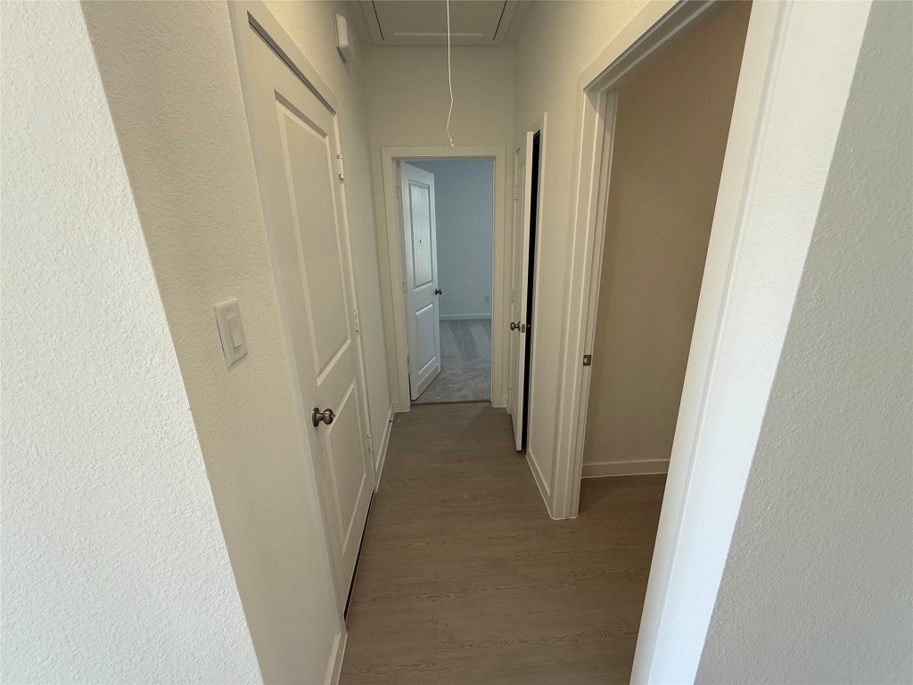 9315 Zander Drive Baytown, TX 77521 - Photo 4 of 21 a view of a hallway and a door