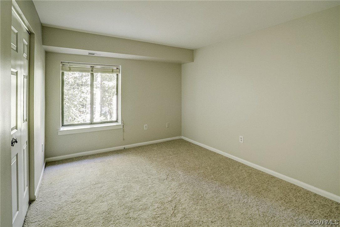 1501 Thistle Road, Unit 103 Henrico, VA 23238 - Photo 16 of 27 an empty room with a window