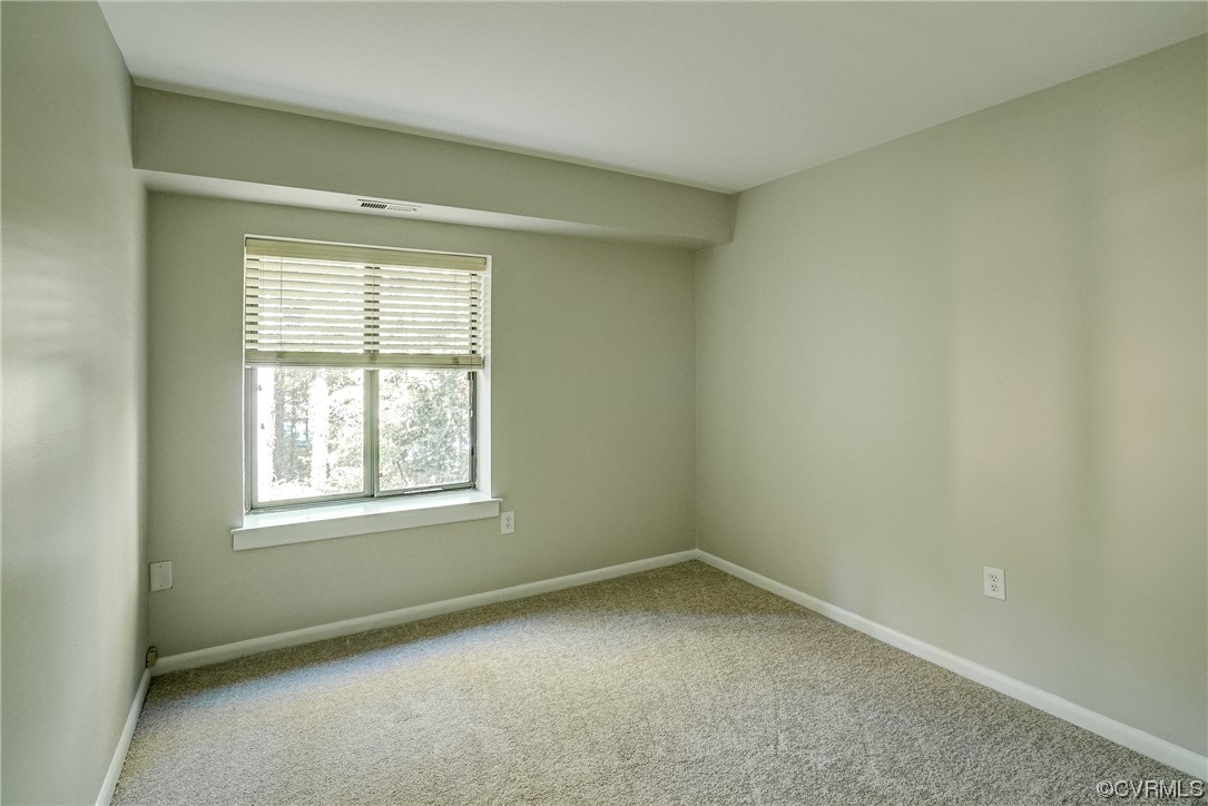 1501 Thistle Road, Unit 103 Henrico, VA 23238 - Photo 19 of 27 an empty room with a window