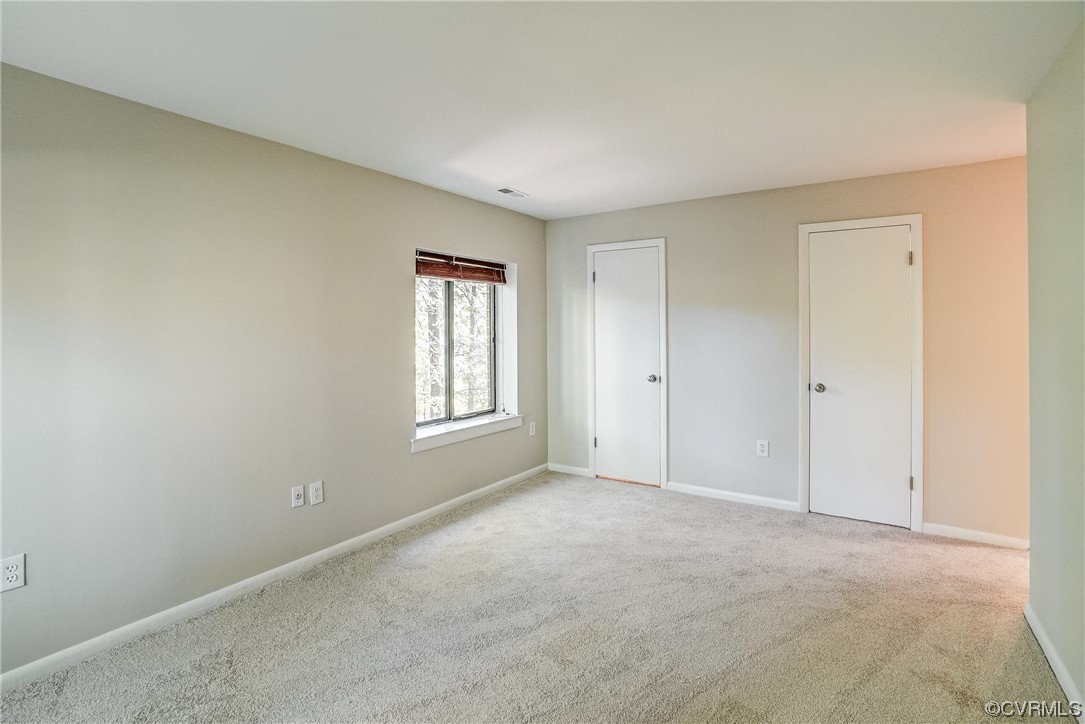 1501 Thistle Road, Unit 103 Henrico, VA 23238 - Photo 22 of 27 a view of an empty room with a window