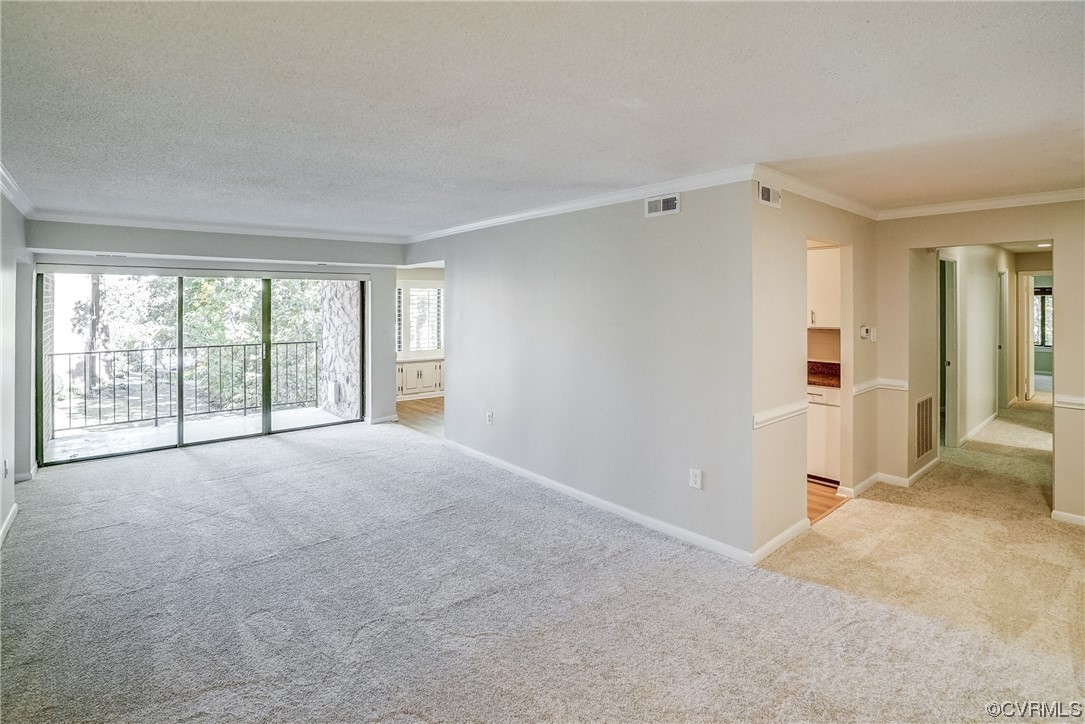 1501 Thistle Road, Unit 103 Henrico, VA 23238 - Photo 4 of 27 a view of empty room with wooden floor and fan
