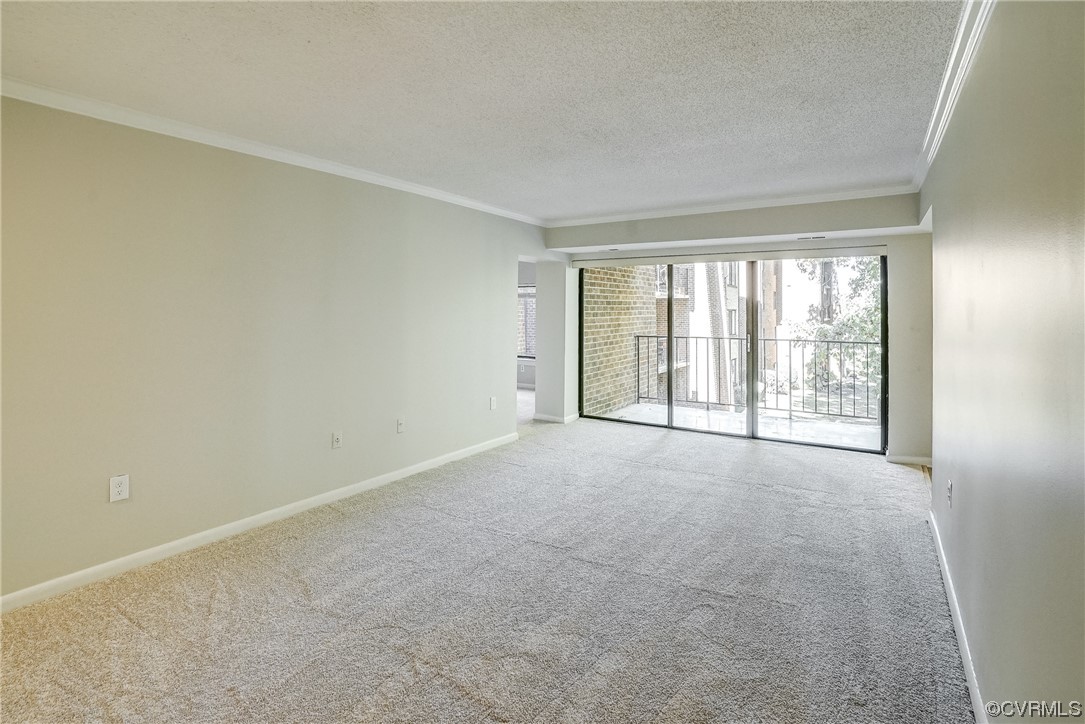 1501 Thistle Road, Unit 103 Henrico, VA 23238 - Photo 5 of 27 a view of an empty room with a window