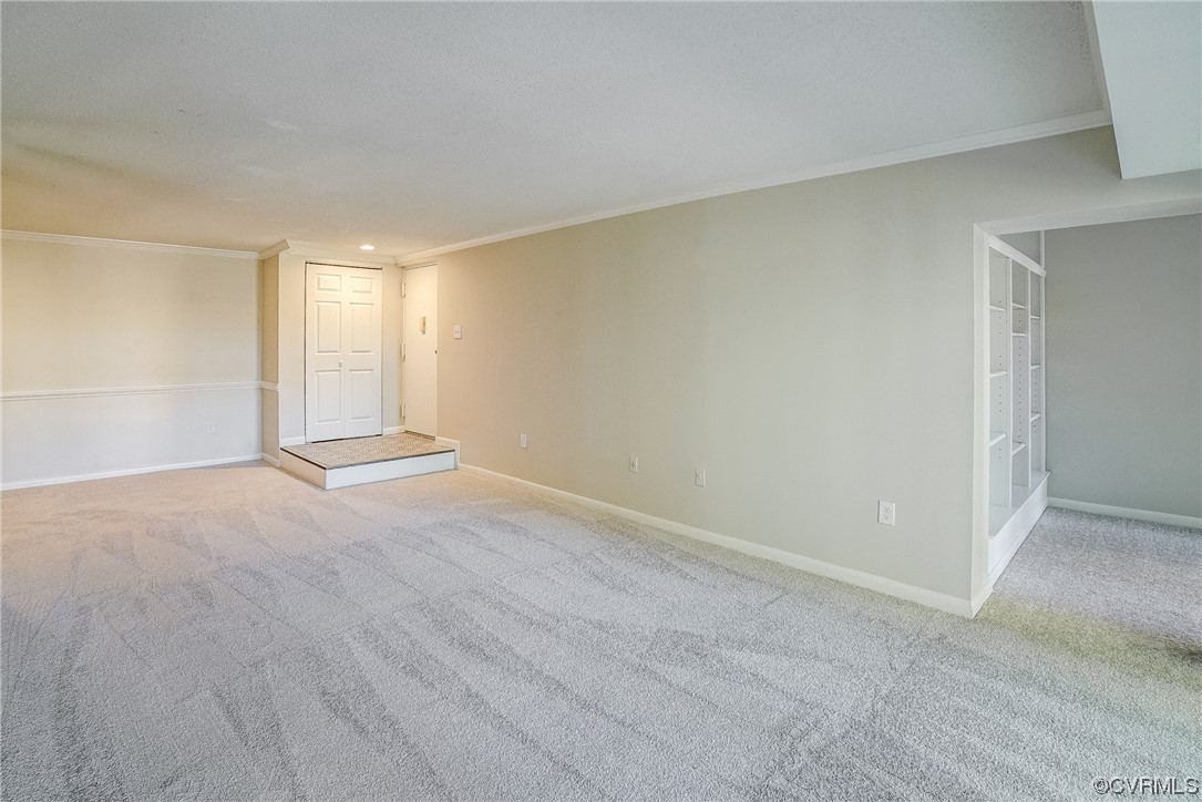 1501 Thistle Road, Unit 103 Henrico, VA 23238 - Photo 6 of 27 a view of an empty room with a window