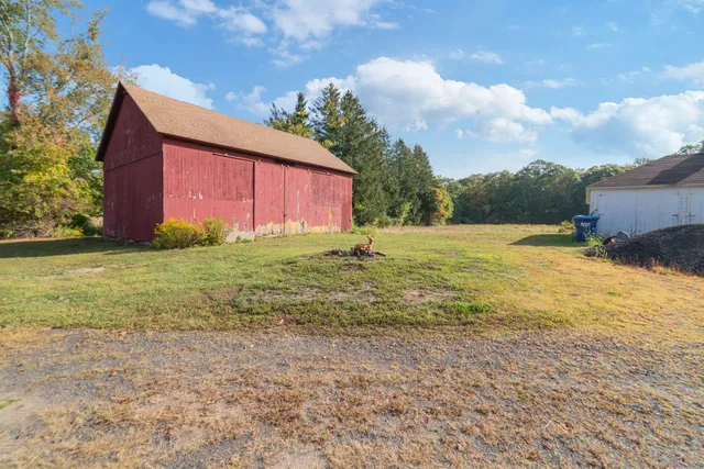 a view of a yard with an trees