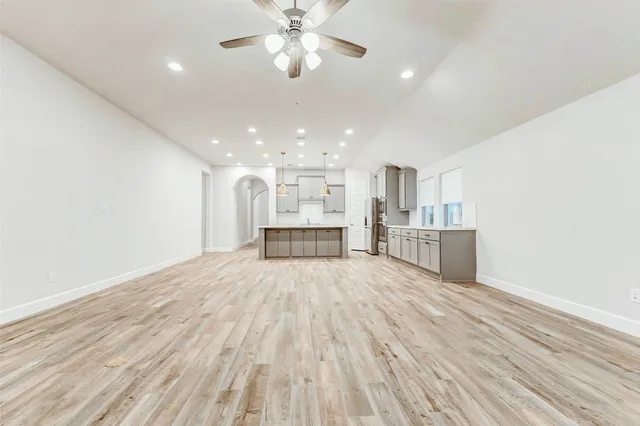 a view of kitchen with wooden floor