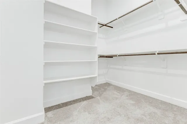 a view of an empty walk in closet