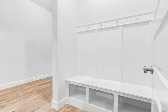 a view of a livingroom with wooden floor