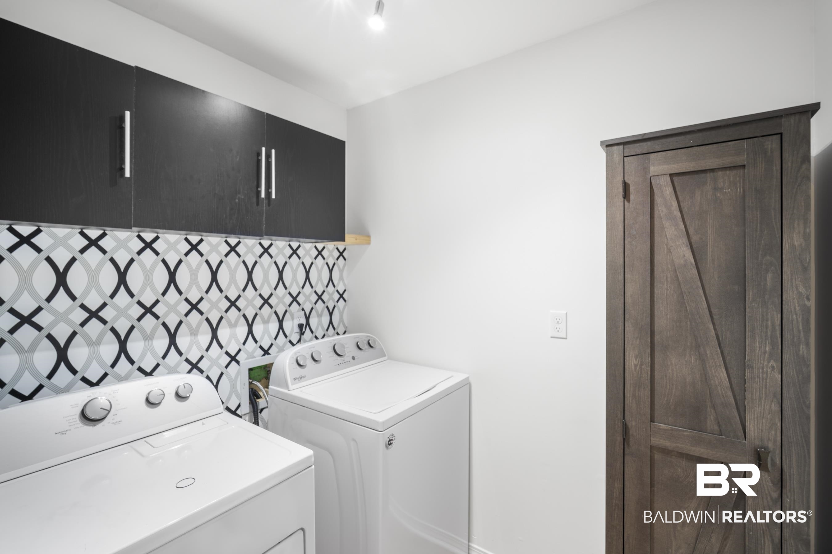 3101 Autumn Ridge Drive West Mobile, AL 36695 - Photo 19 of 36 Washroom featuring cabinet space, independent washer and dryer, and a barn door