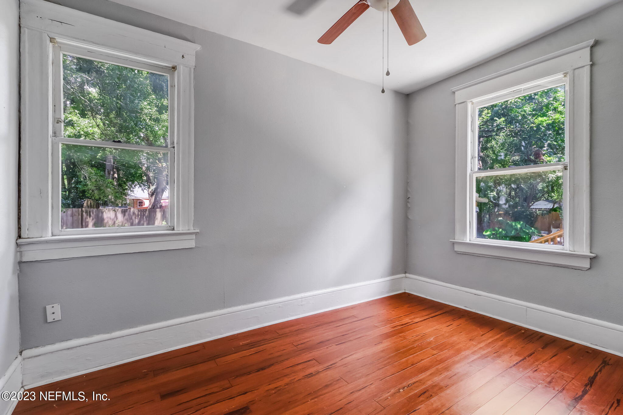 2805 College Street Jacksonville, FL 32205 - Photo 20 of 40 a view of empty room with wooden floor and fan