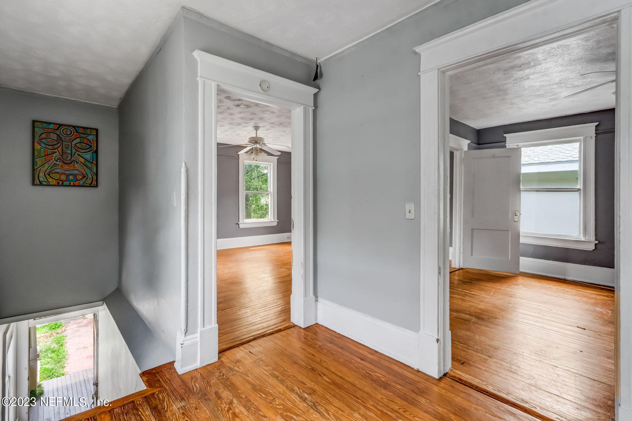 2805 College Street Jacksonville, FL 32205 - Photo 24 of 40 a view of hallway with window and wooden floor