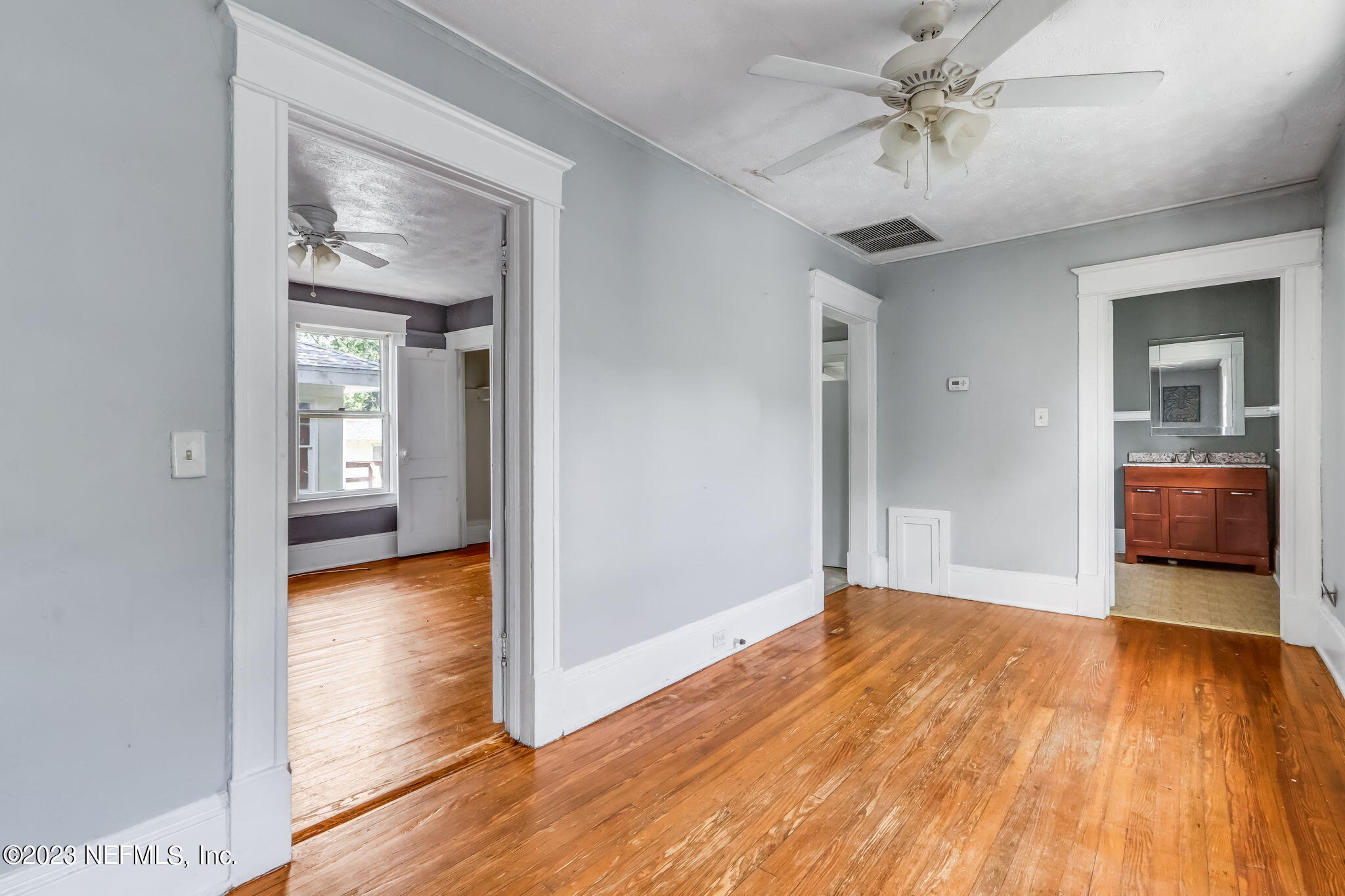 2805 College Street Jacksonville, FL 32205 - Photo 33 of 40 a view of a hallway view with wooden floor and a bathroom