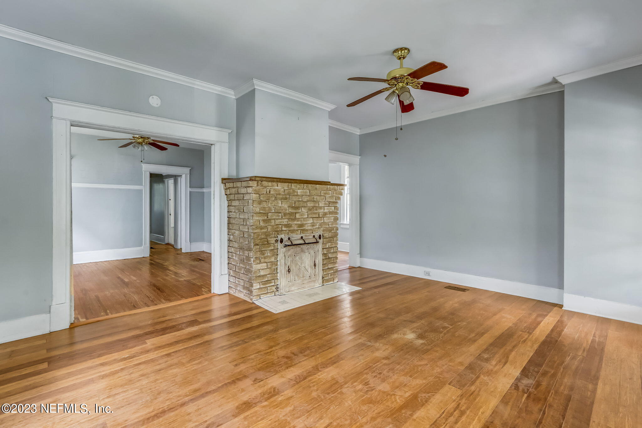 2805 College Street Jacksonville, FL 32205 - Photo 10 of 40 wooden floor in an empty room with a window