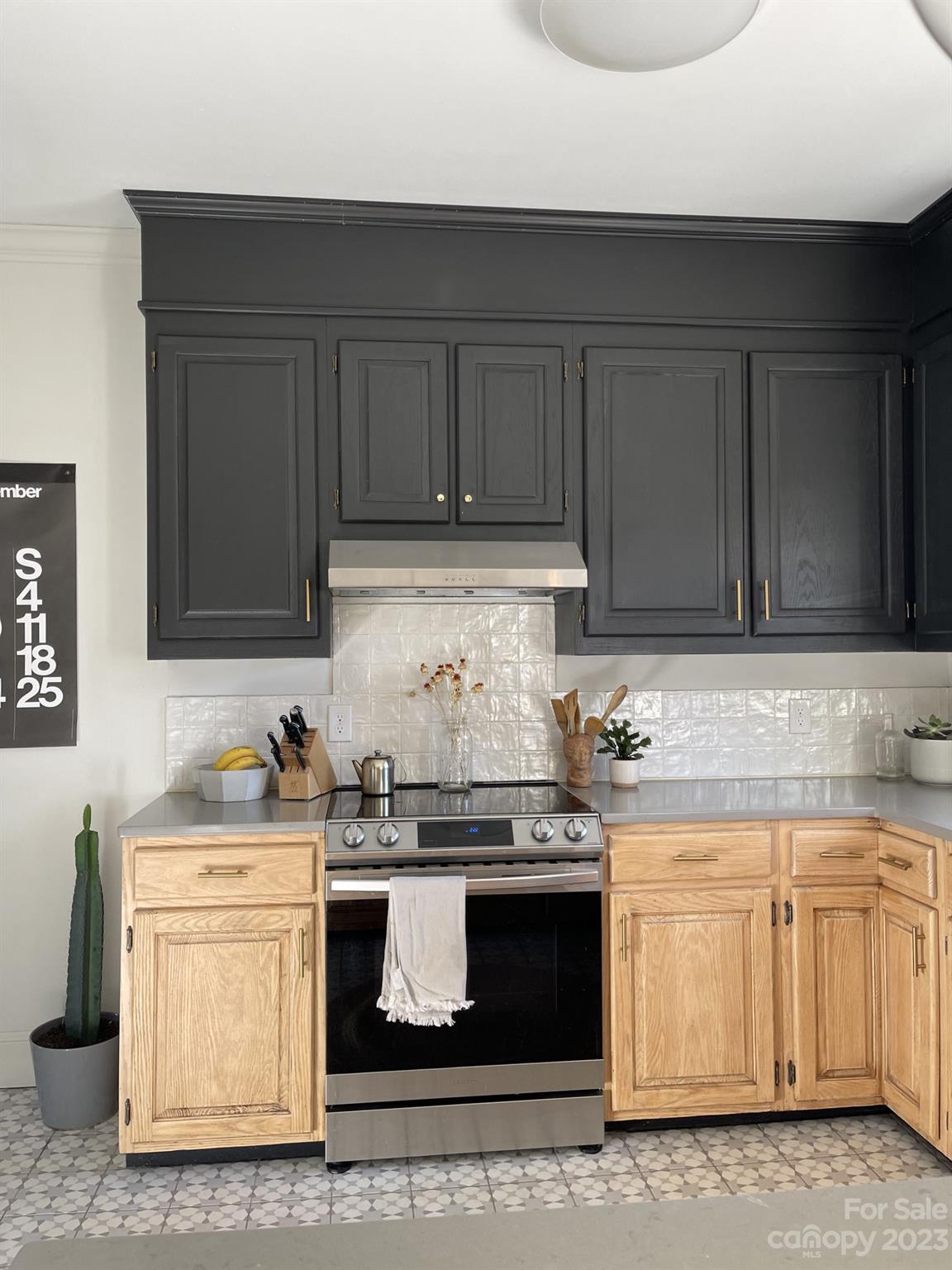 4101 Coleman Drive Charlotte, NC 28215 - Photo 17 of 34 a kitchen with a sink and cabinets