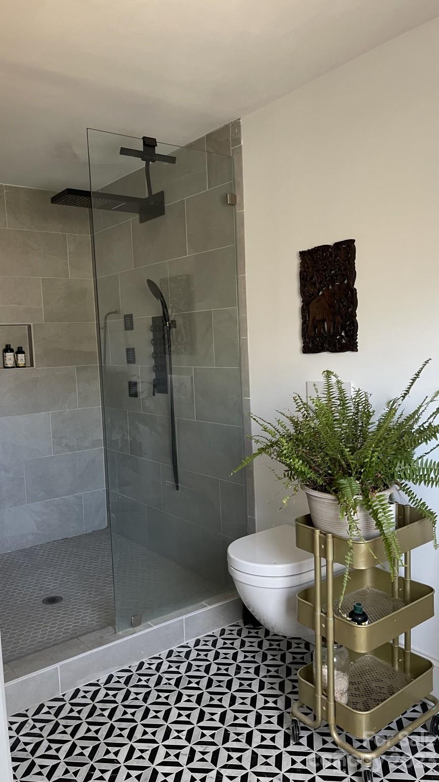 4101 Coleman Drive Charlotte, NC 28215 - Photo 29 of 34 a bathroom with a toilet and a shower