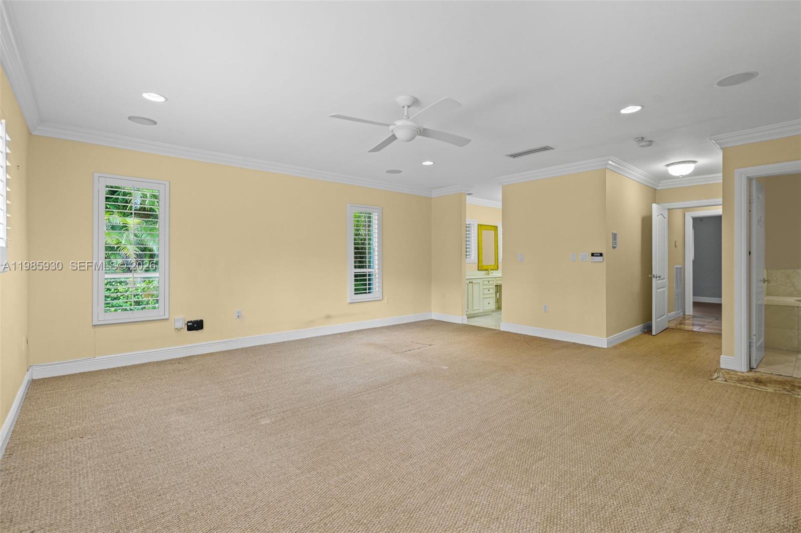 13276 Southwest 58th Court Pinecrest, FL 33156 - Photo 42 of 67 a view of an empty room with a window