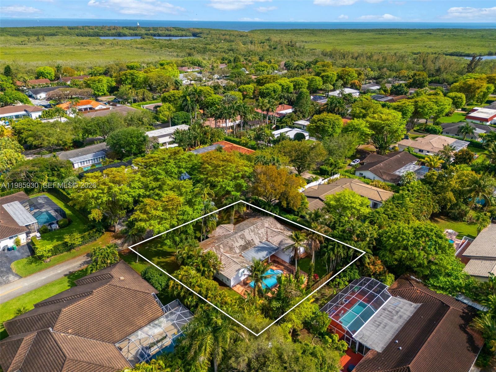 13276 Southwest 58th Court Pinecrest, FL 33156 - Photo 63 of 67 a view of a tennis court