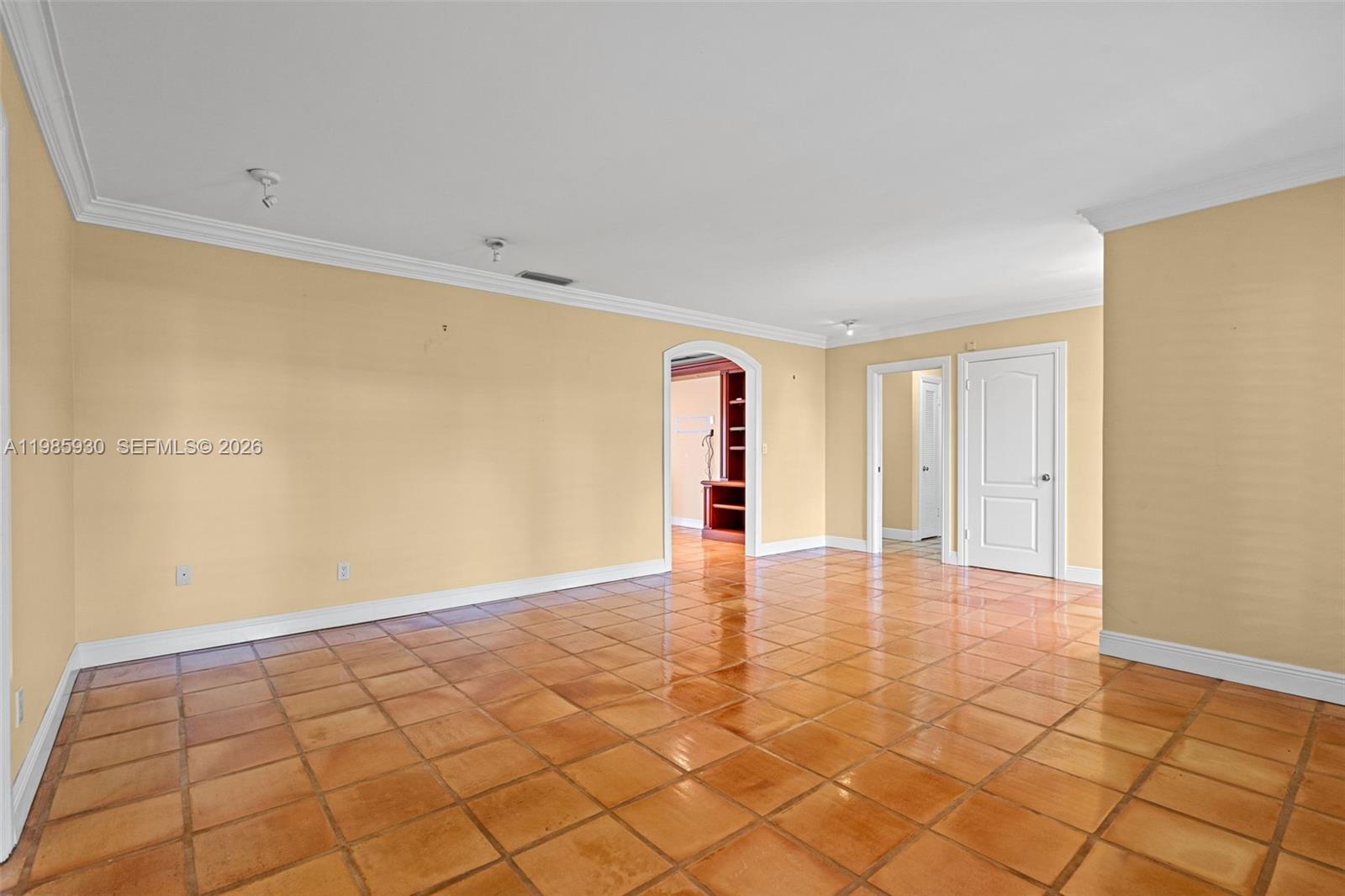 13276 Southwest 58th Court Pinecrest, FL 33156 - Photo 9 of 67 a view of an empty room with a window