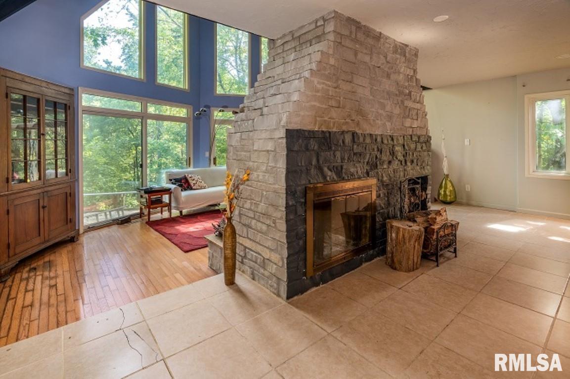 412 Wagon Wheel Road Carbondale, IL 62902 - Photo 12 of 30 a living room with furniture and a fireplace