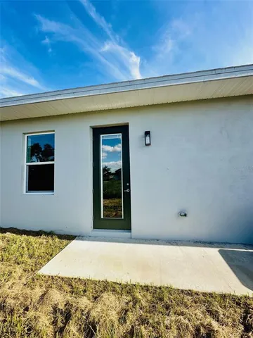 a view of a backyard of a house