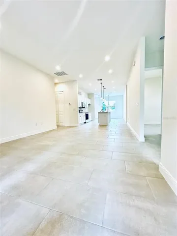 a view of a kitchen with a sink