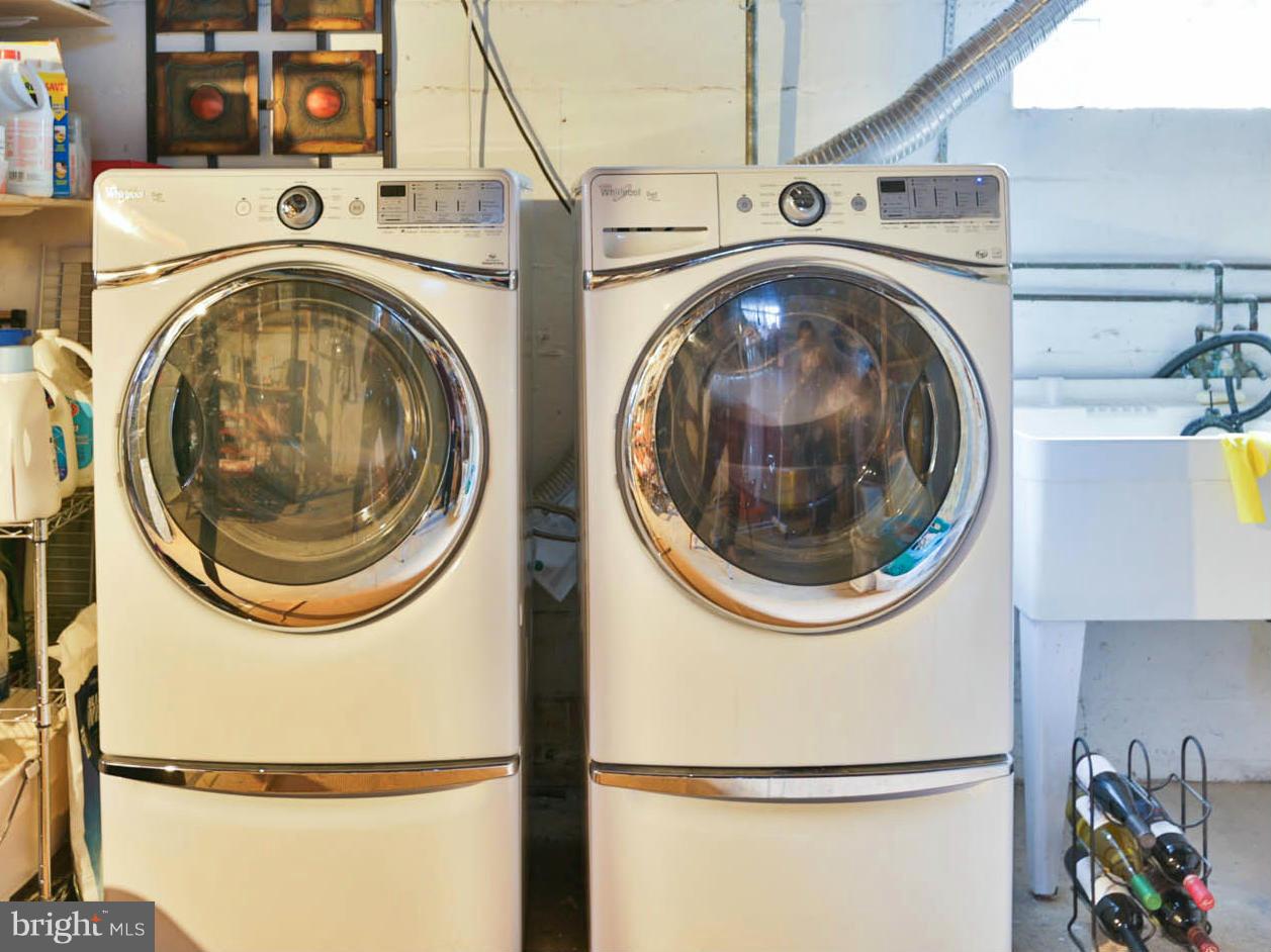 903 Adana Road Pikesville, MD 21208 - Photo 17 of 24 Equipped with front loading washer and dryer