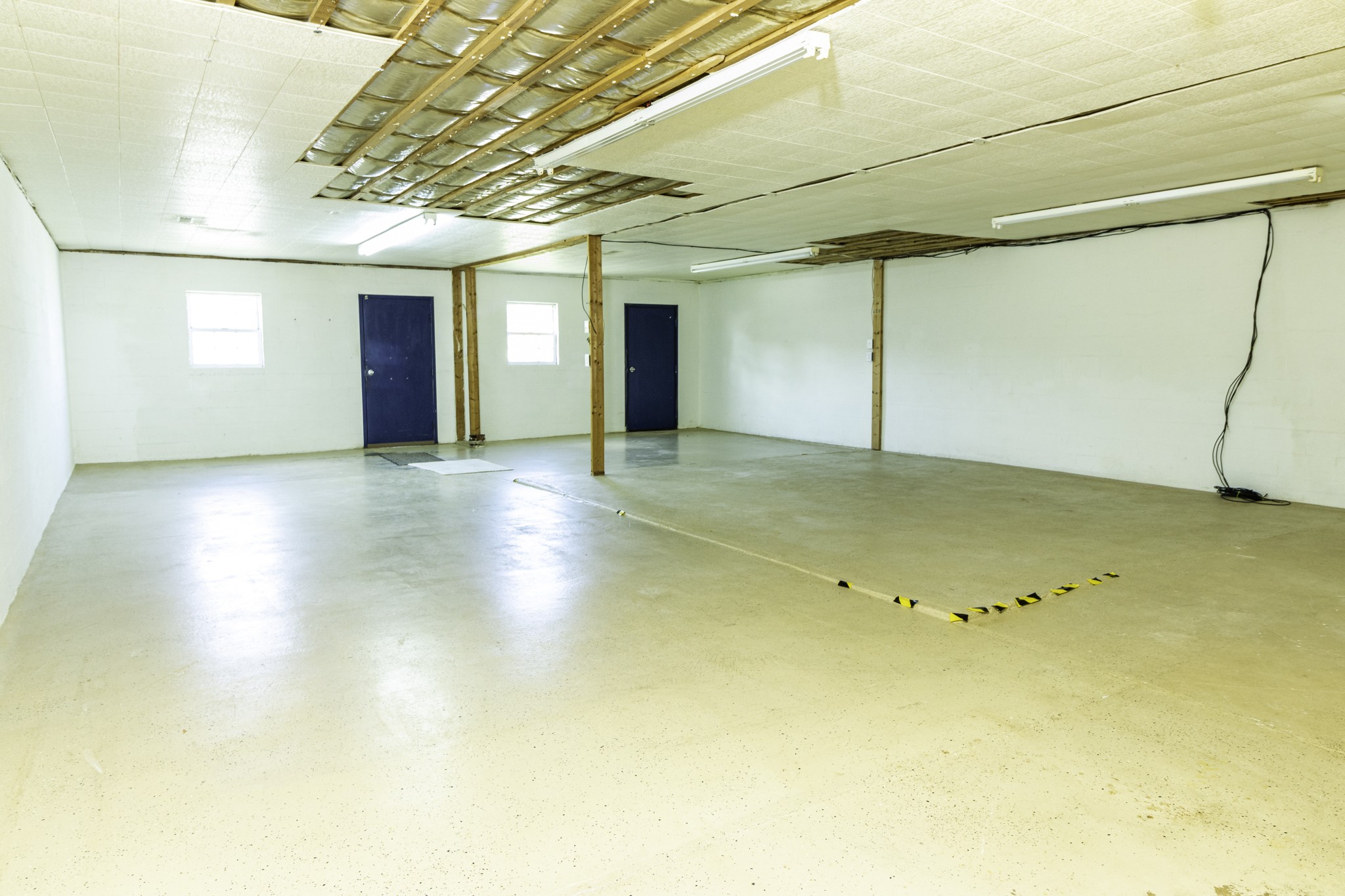 124 Chestnut Street Pulaski, TN 38478 - Photo 11 of 33 a view of a big room with an empty space