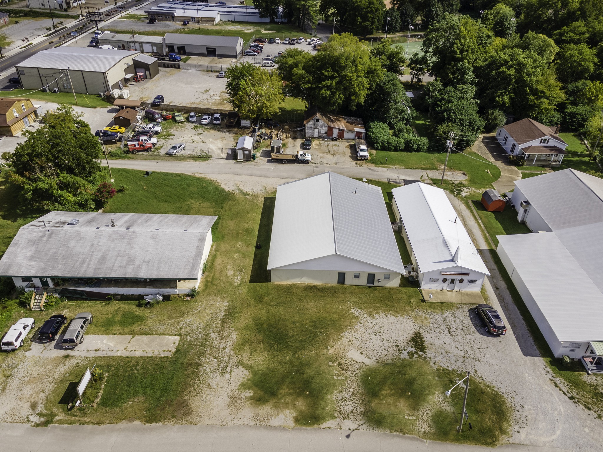 124 Chestnut Street Pulaski, TN 38478 - Photo 28 of 33 an aerial view of a house with swimming pool and garden