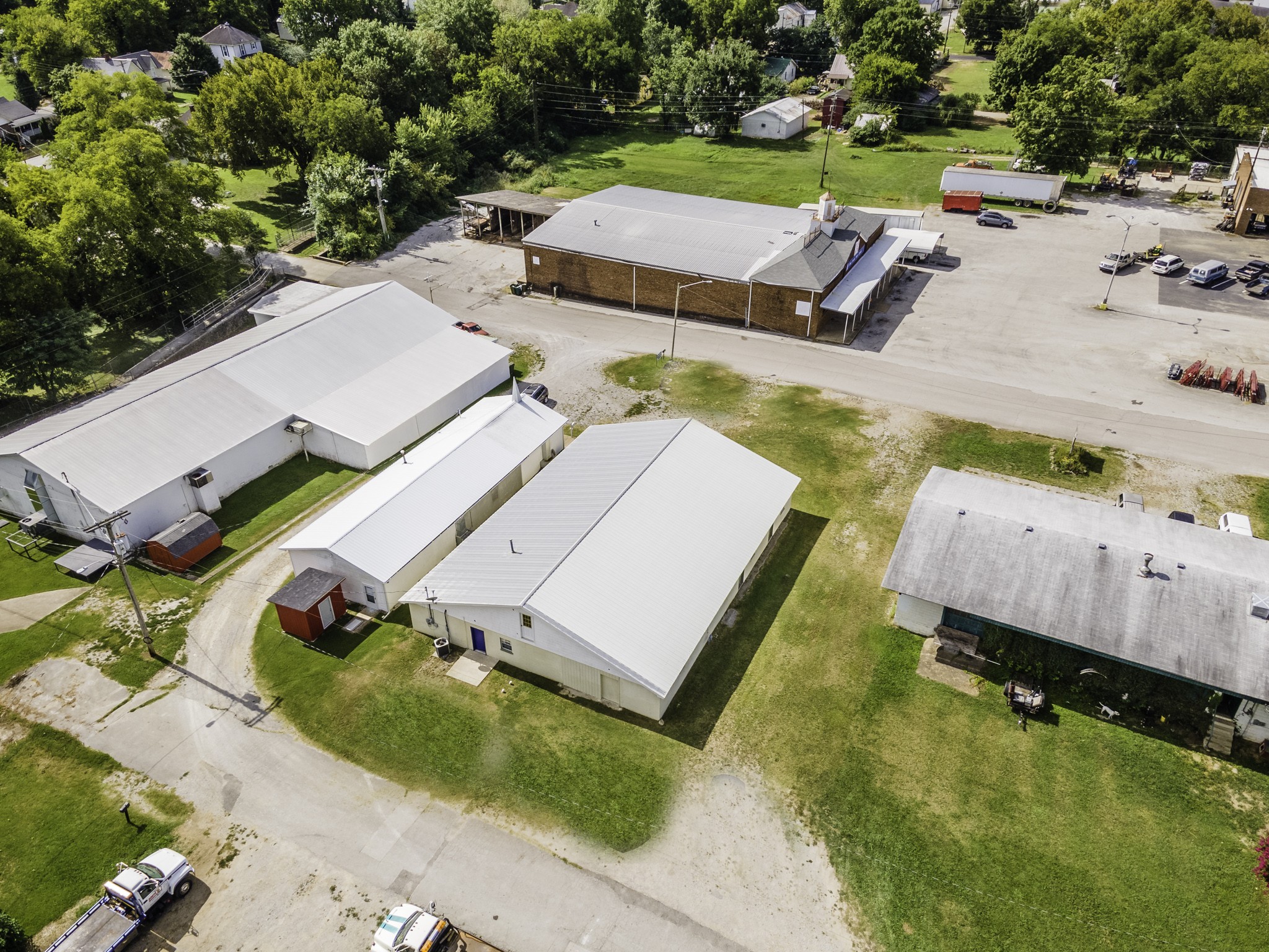 124 Chestnut Street Pulaski, TN 38478 - Photo 30 of 33 an aerial view of a garden with swimming pool