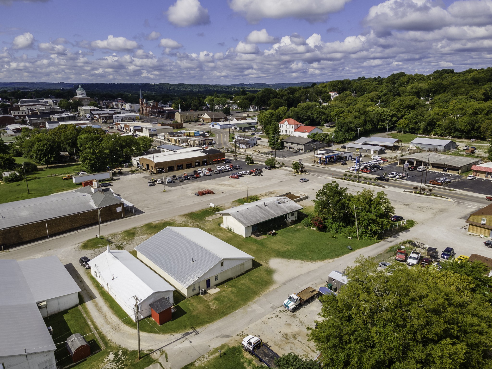 124 Chestnut Street Pulaski, TN 38478 - Photo 32 of 33 a view of a houses with a yard and a car park