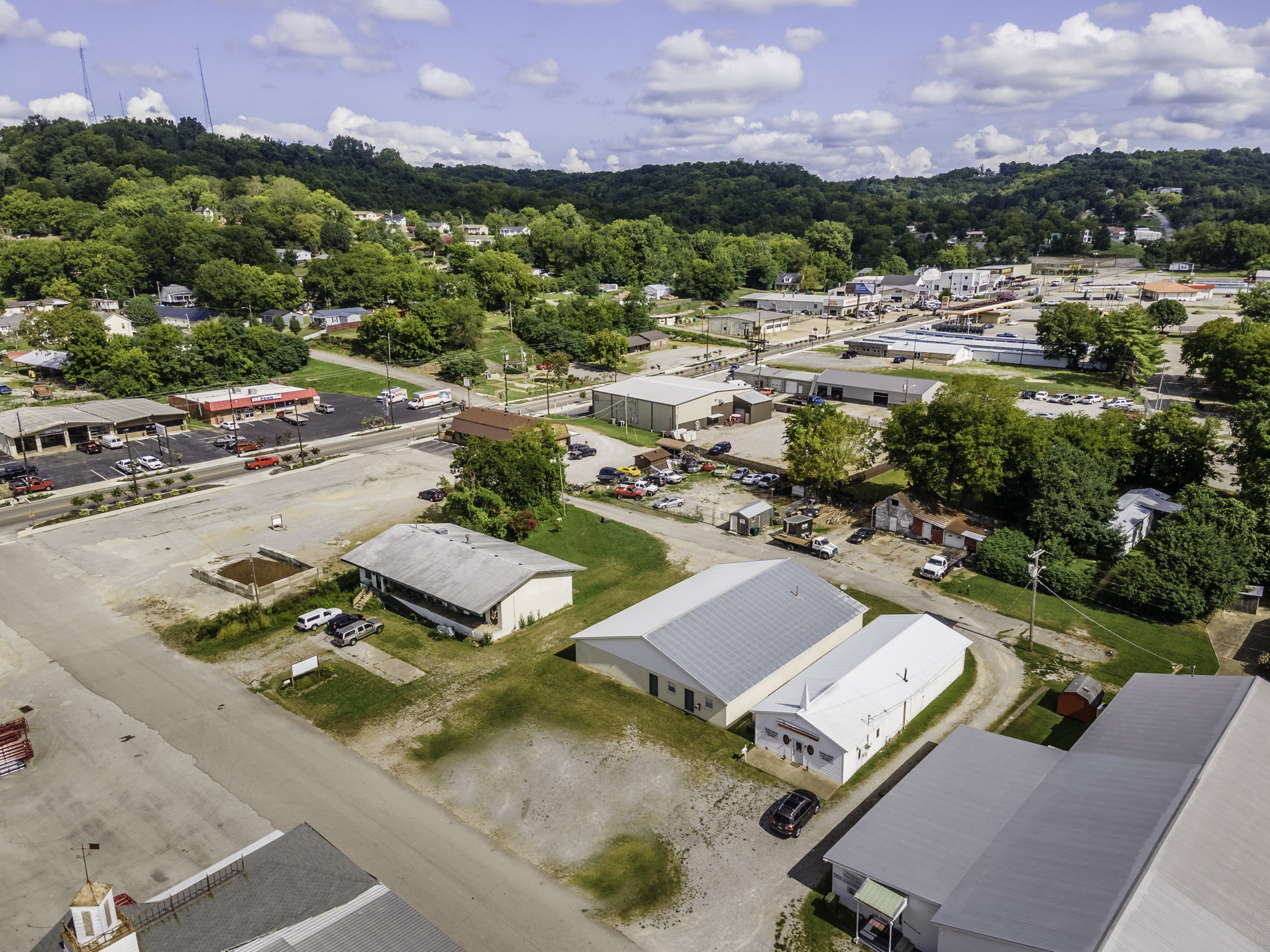 124 Chestnut Street Pulaski, TN 38478 - Photo 33 of 33 an aerial view of a swimming pool and mountain view