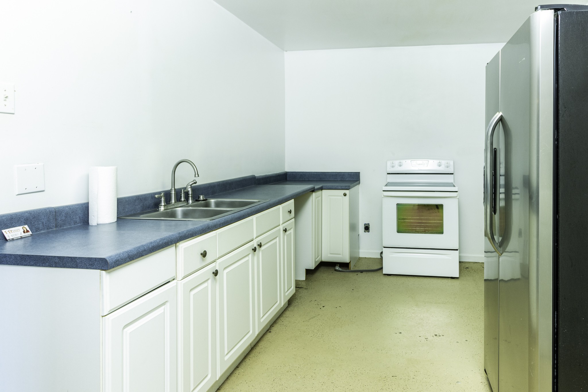124 Chestnut Street Pulaski, TN 38478 - Photo 6 of 33 a kitchen with a sink and cabinets
