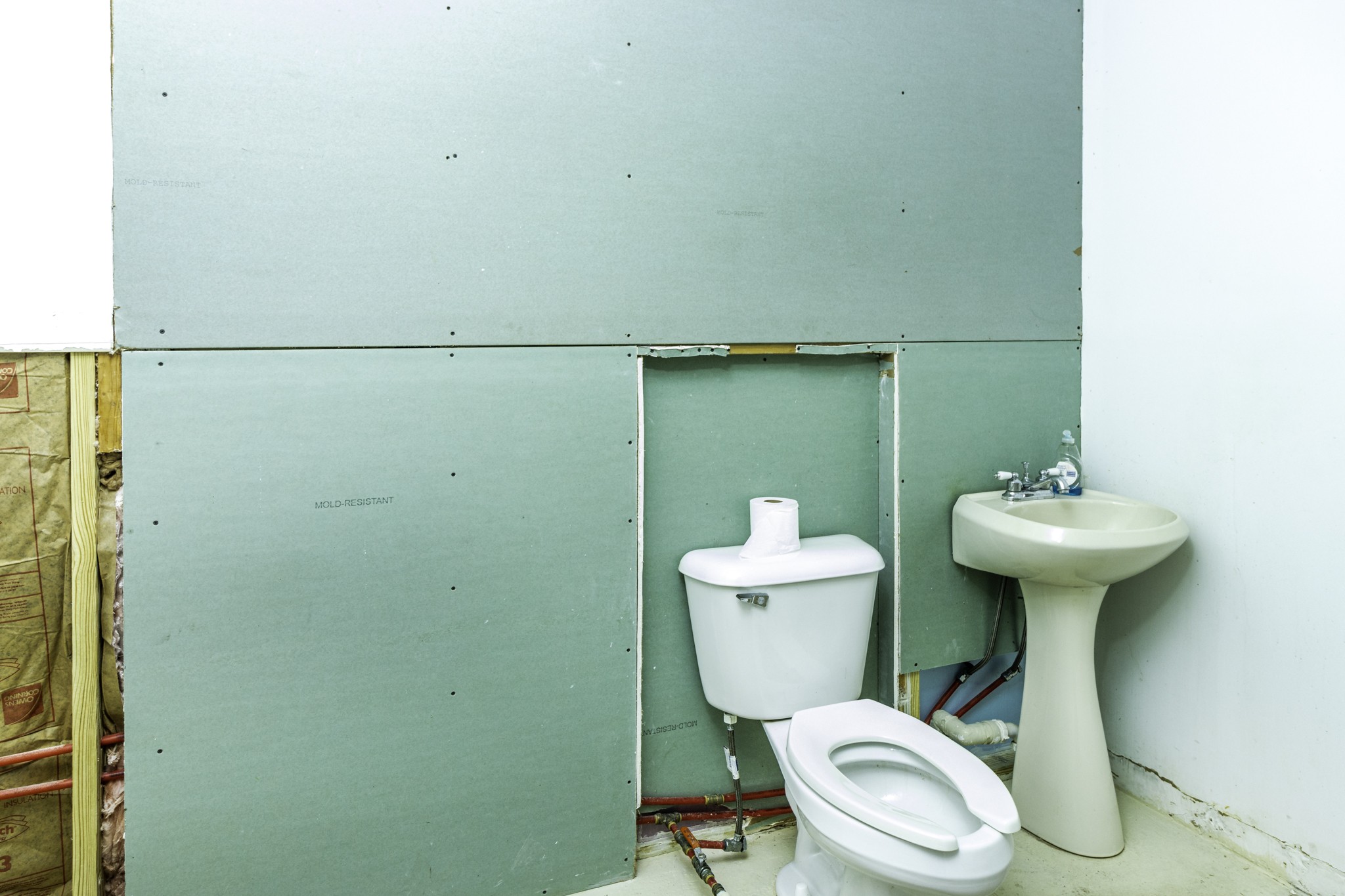 124 Chestnut Street Pulaski, TN 38478 - Photo 7 of 33 a bathroom with a sink a toilet and a mirror