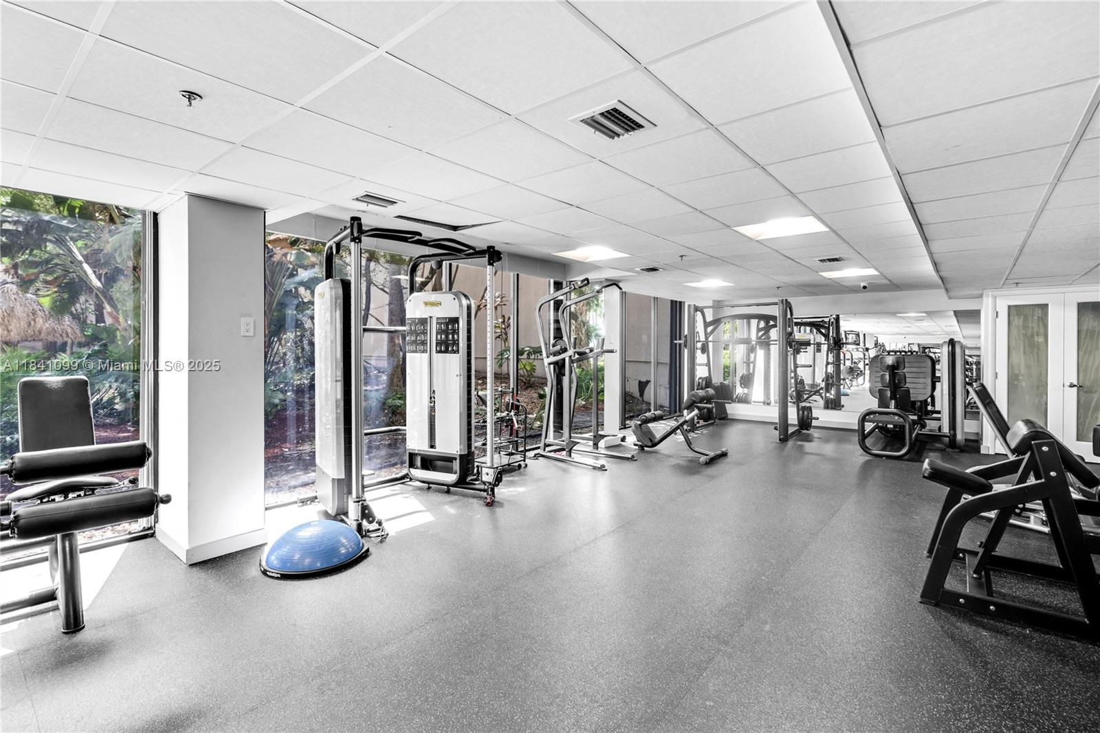540 Brickell Key Drive, Unit 1021 Miami, FL 33131 - Photo 26 of 30 a view of a room with gym equipment
