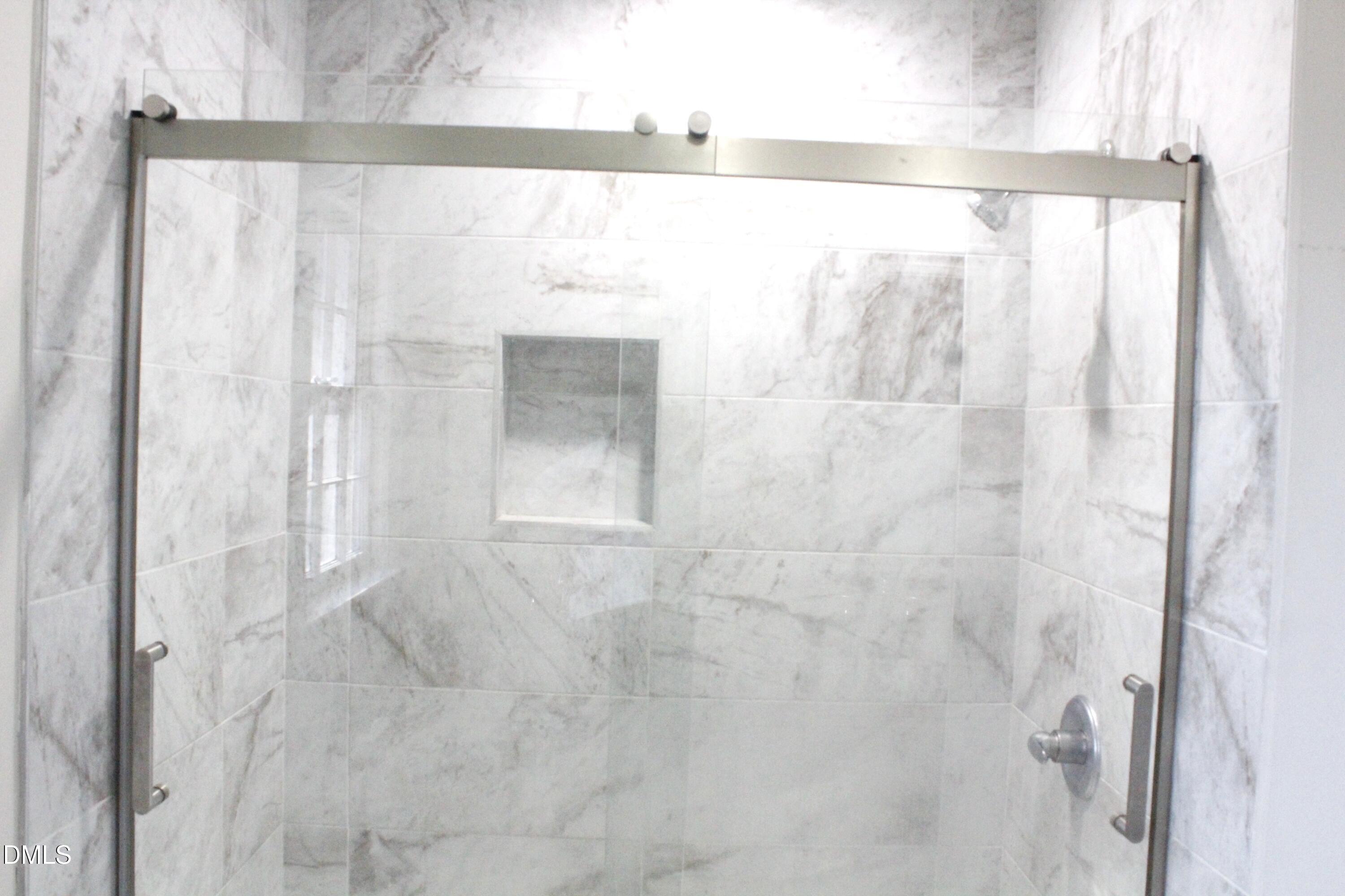 907 Leggett Road Rocky Mount, NC 27801 - Photo 14 of 23 a bathroom with a shower